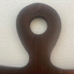 Custom wood handle the big hallow circle.