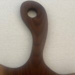 Custom wood handle the big hallow circle bent left.