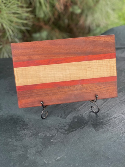 Sapele, padauk, and curly maple cutting board.