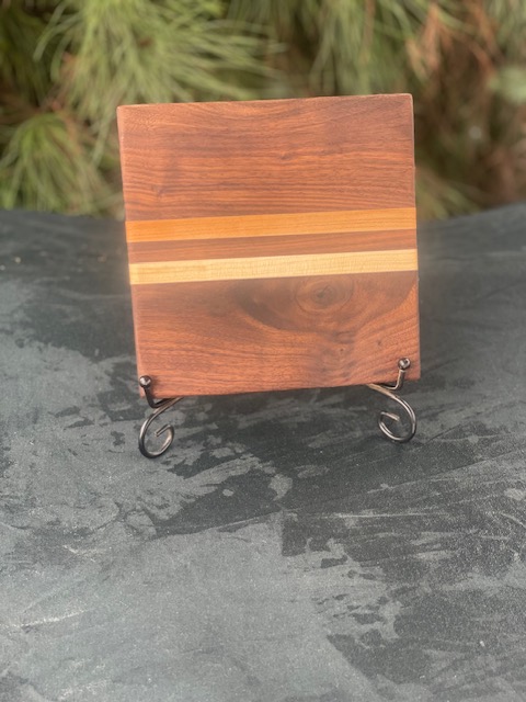 Black walnut and maple colored cutting board.