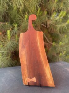 Blk walnut charcuterie, maple butterfly, monkey paw handle