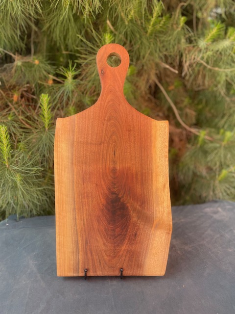 black walnut charcuterie board with shoulder handle