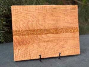cutting board made from white wenge and maple