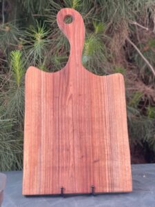 large black walnut charcuterie w left curved handle