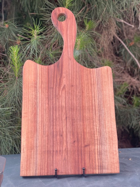 large black walnut charcuterie w left curved handle