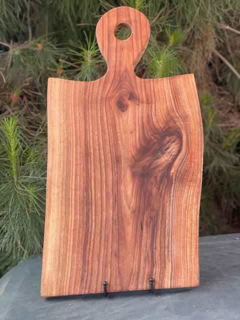 large black walnut with lollipop handle charcuterie