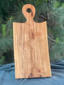 spalted maple charcuterie board with lollipop handle