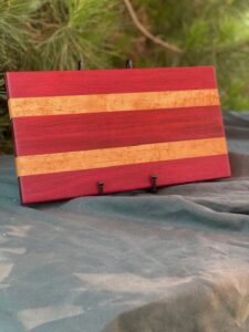 small sized board. purple and white stripes